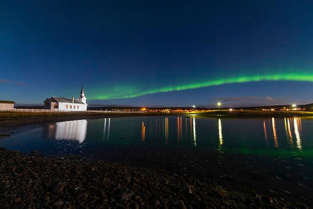 Nesseby Church in the Northern lights